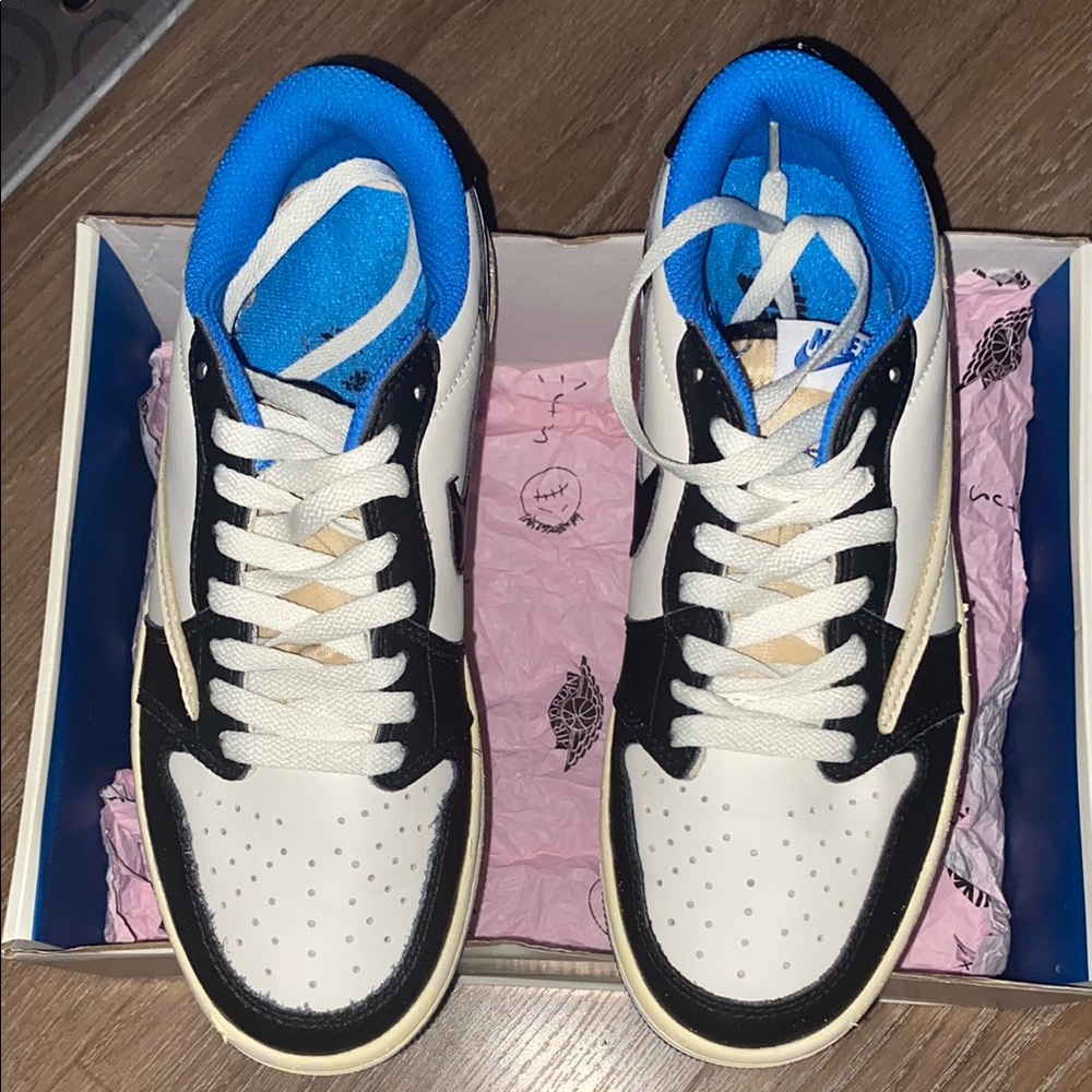 Stylish Black and White Sneakers with Blue Accents TRAVIS SCOTT’S